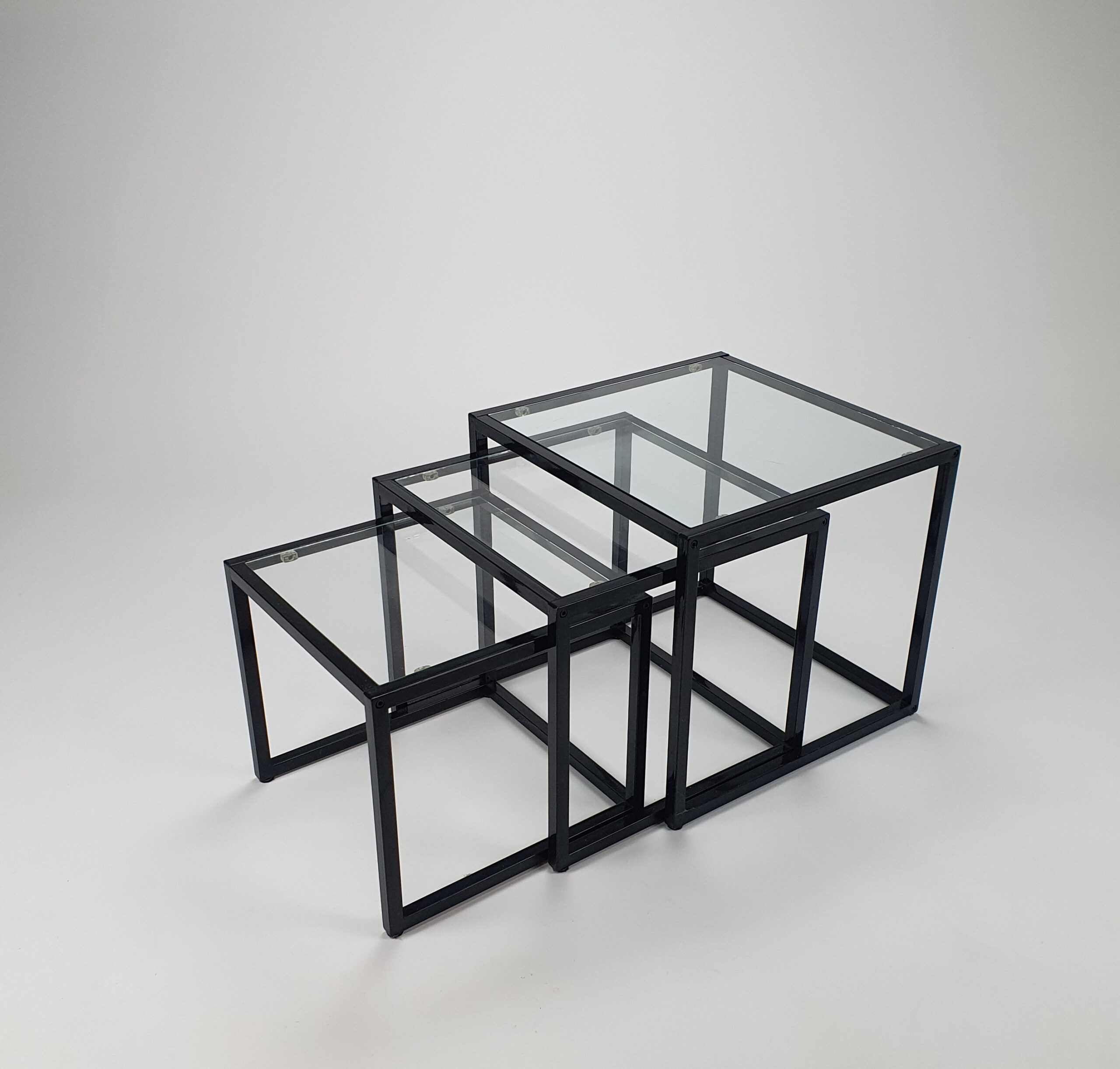 postmodern glass and steal nesting tables 1980s