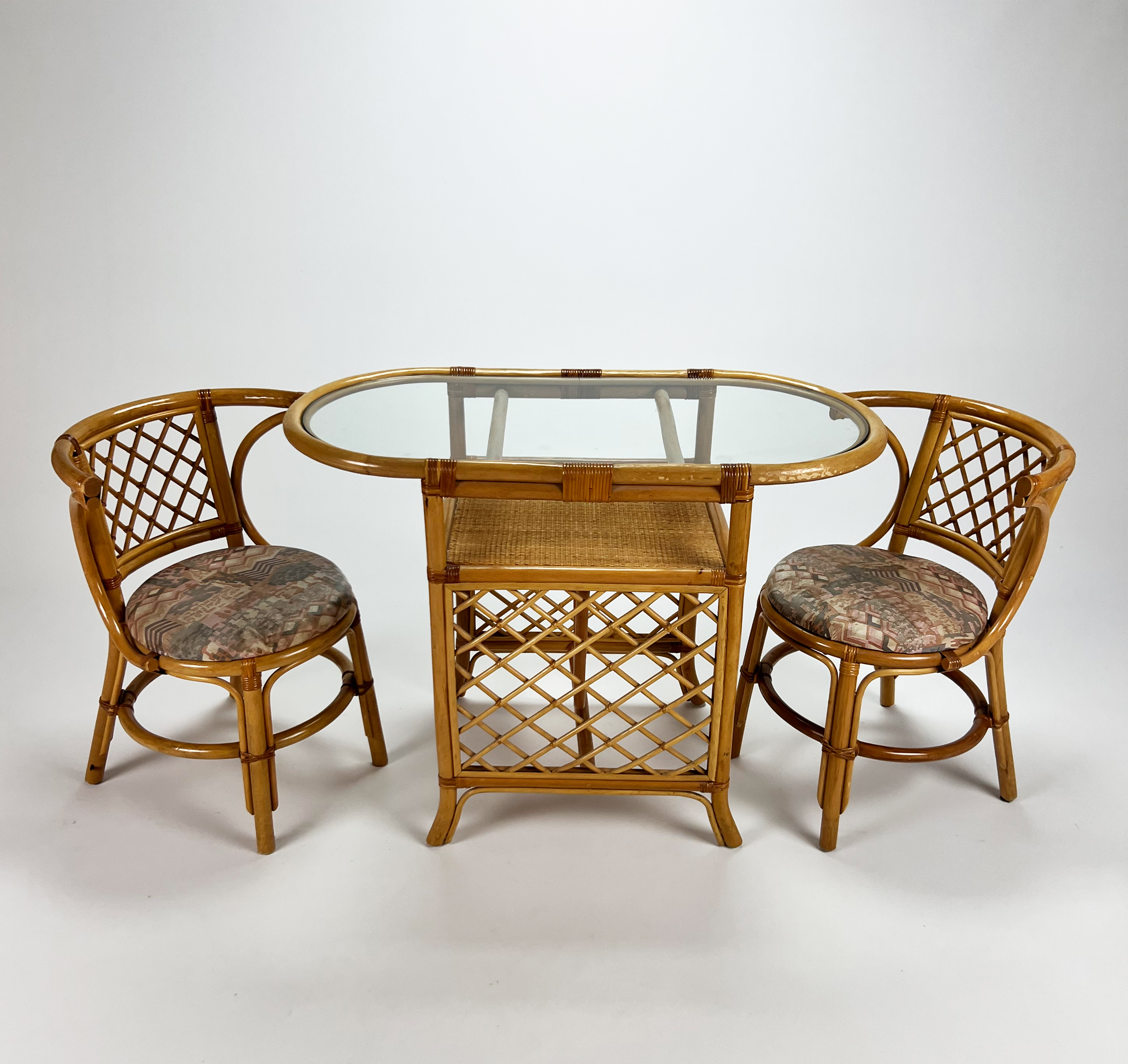 Mid century bamboo and wicker side table and two chairs, 1960's